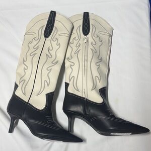 Elegant Black and Cream Heeled Boots